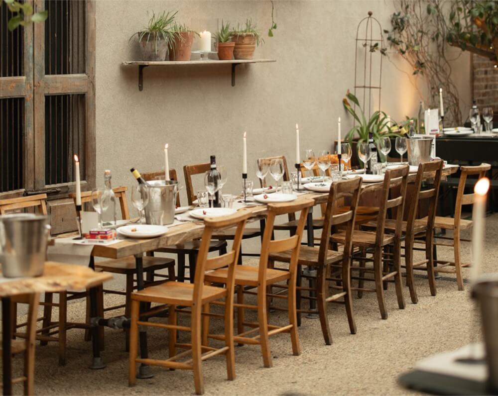 Long treacle table set up for a wedding hire.