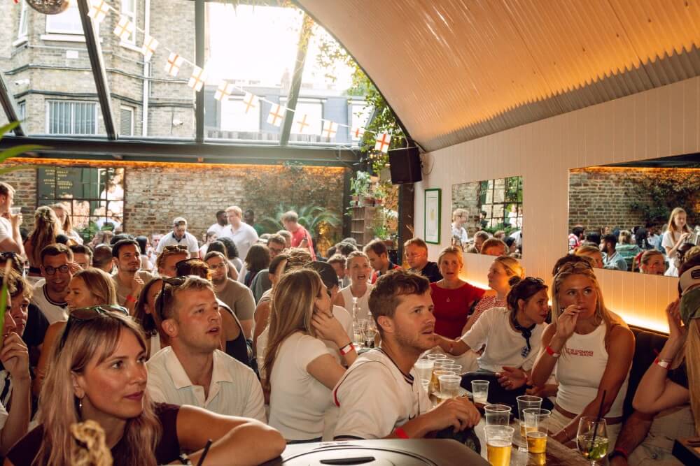 Guests watching the football during the World Cup