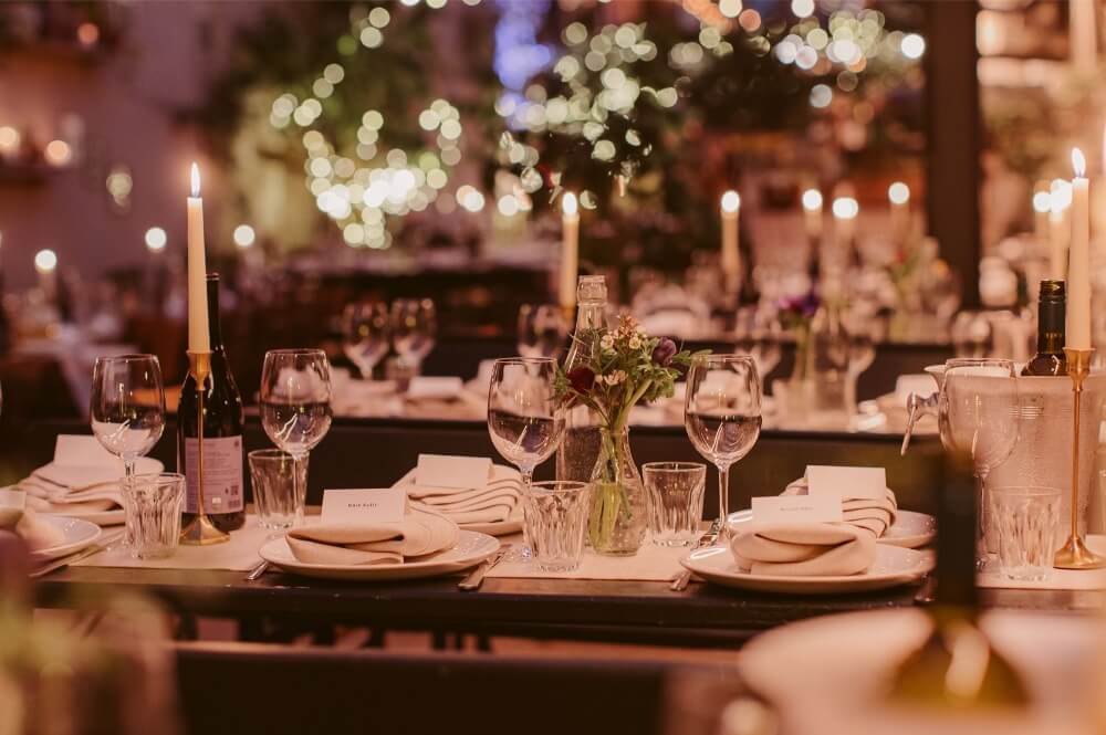 A close up of a beautiful table set up at an engagement party