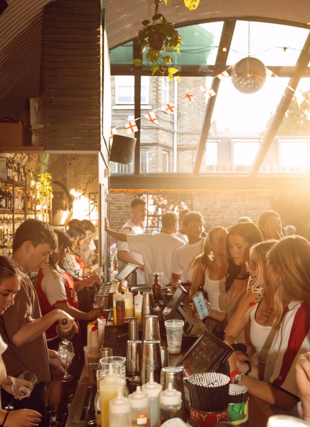 Guests buying drinks at the bar